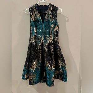 Beautiful Vince Camuto Metallic pleated fit and flare dress.